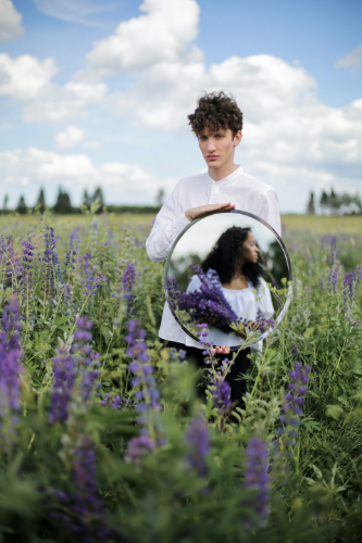 A pictorial of a man and woman in a lavender fields